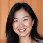 Lisa Kim, 45, smiling confidently.
